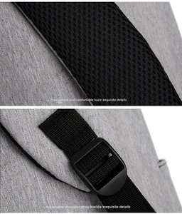 Detail of breathable honeycomb mesh back and adjustable shoulder strap buckle on grey backpack