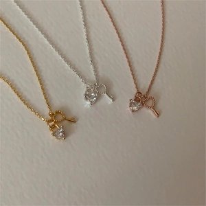 Detailed comparison of heart lock necklaces in gold, silver, and rose gold finishes
