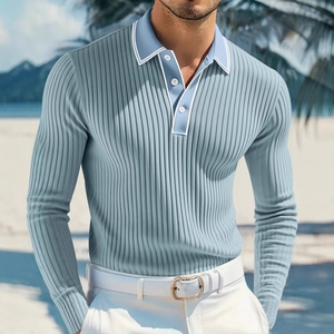 Men's light blue long sleeve polo shirt with vertical stripes and white trim on beach