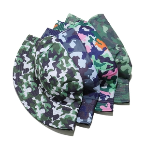 Collection of various camouflage sun hats showing reinforced stitching and durable canvas fabric