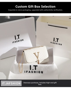 Detail of white quilted handbag with golden V logo flap and elegant chain strap