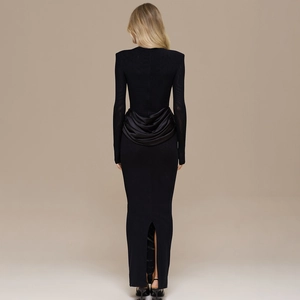 Rear view of black bodycon dress featuring elegant waist ruching and a back slit detail