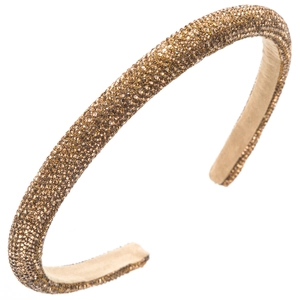 Detail eines champagnergoldenen Strass-Haarreifs mit weicher Stoffpolsterung innen