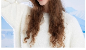 Detail of soft white long-haired plush knit sweater texture for winter warmth