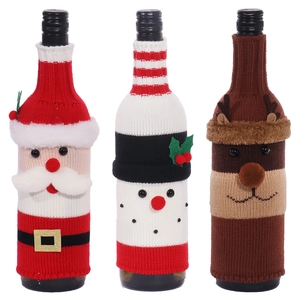 Knitted Christmas wine bottle covers featuring Santa, snowman, and elk designs