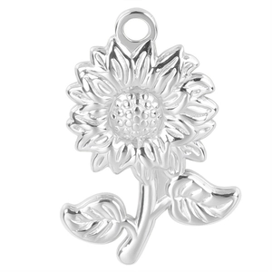 Detail of silver stainless steel sunflower pendant with delicate petal and leaf textures