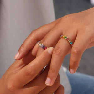 Close-up of 18K gold plated stainless steel rings featuring micro-set colorful zircon stones