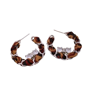 Chic leopard print fabric wrapped C-shaped earrings with zircon accents and silver needle
