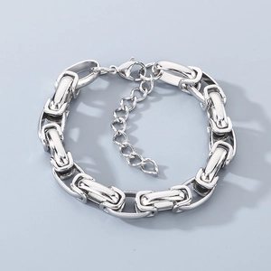 Bracelet gourmette en argent poli avec extension réglable et détail de fermoir homard