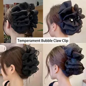 Élégant ensemble de pinces à cheveux noires surdimensionnées pour diverses coiffures