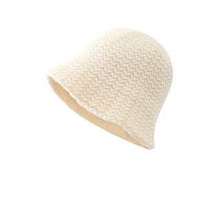 Beige knitted bucket hat with thick cable knit texture for women winter fashion