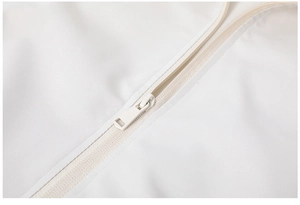 Detail of a white casual jacket with a smooth polyester fabric and matching metal zipper