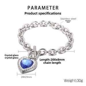 Macro detail of OT toggle clasp and blue heart crystal on stainless steel bracelet
