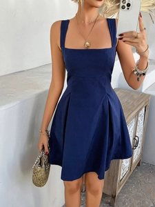 Full-body shot of a light blue A-line slip dress with soft draping fabric on a model