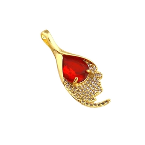 Elegant gold drop pendant with a large red gemstone and micro-pave white zircon accents