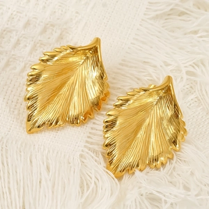 Golden leaf-shaped stainless steel stud earrings with detailed vein texture for women