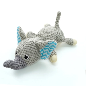 Detail of grey elephant plush dog toy with textured corn fleece and breathable mesh fabric
