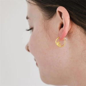 S925 silver gold angel cupid embossed hoop earrings shown on model for elegant look