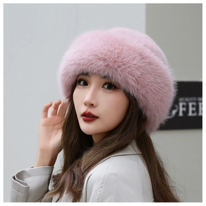 Close-up of pink faux fur winter hat showing plush texture and warm ear protection