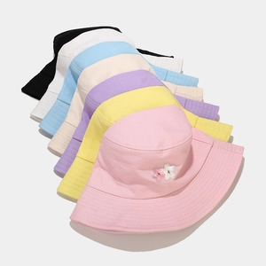 Cotton bucket hats for women featuring floral embroidery in multiple vibrant colors