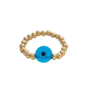 18K gold-plated beaded ring with blue glass evil eye charm in bohemian ethnic style