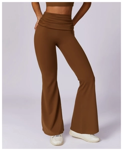 Detail of high-waist pleated waistband on mocha brown flared yoga leggings for women