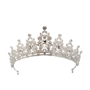 Detailed view of silver crown tiara with sparkling crystal rhinestones for luxury bridal wear