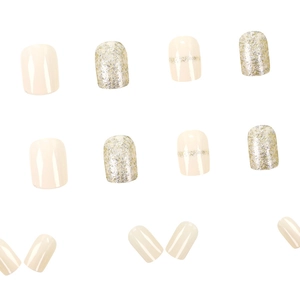 Short creamy white gradient press-on nails set with glitter accents in multiple sizes