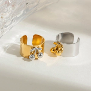 Polished stainless steel open ring with two-tone cherry charms in gold and silver