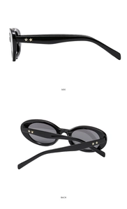 Side and back view of black oval sunglasses with golden star rivets on the temples