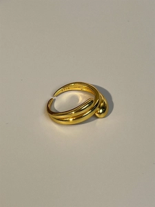 Detail of s925 gold-plated ring with double-layered wrap design and waterdrop metal ends