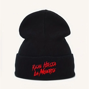 Black beanie featuring red Real Hasta La Muerte embroidery with clear knit texture