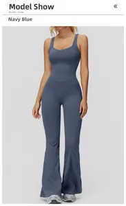 Detailed view of navy blue brushed yoga jumpsuit with wide straps and flared leg design