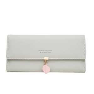 Detail of grey PU leather flap wallet with pink leaf pendant and neat stitching