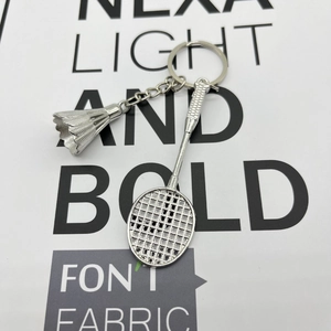 Miniature metal badminton racket and shuttlecock keychain in polished silver finish