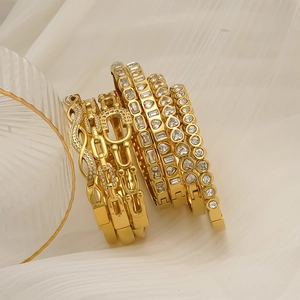 Set of 6 gold-plated stainless steel bangles with sparkling zircon stone accents