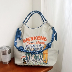 Sac fourre-tout en toile beige avec bandoulières bleues brodées et motif rétro Hawaii