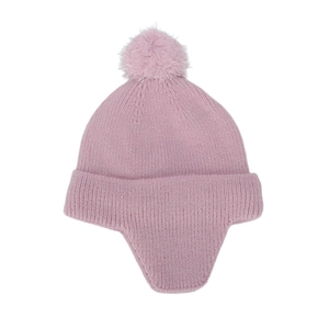 Detail of pink knitted winter hat for kids with soft fleece lining and fluffy pom-pom