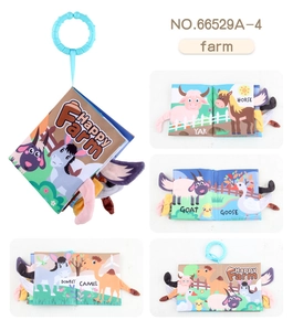 Detail view of Happy Farm baby cloth book with 3D tails and crinkle paper pages