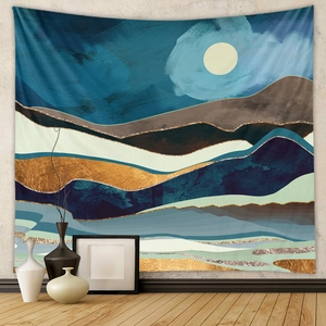 Detail of abstract landscape tapestry featuring blue mountains and gold foil accents