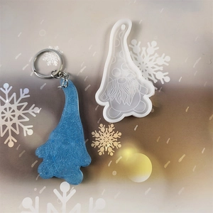 Christmas gnome resin silicone mold with blue glitter epoxy pendant and key ring