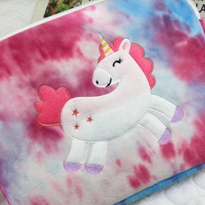 Tie-dye plush 11-inch iPad sleeve featuring a cute unicorn embroidery design