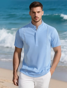 Close-up of light blue Henley polo with vertical stripe texture on a beach