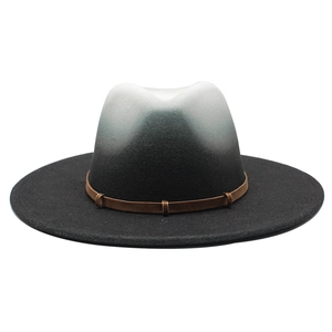 Detail of wool fedora with gradient spray paint and brown leather band with buckles
