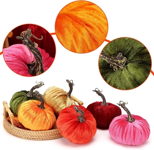 Detail showing soft velvet texture and realistic resin stems on assorted harvest pumpkins
