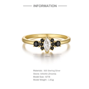 Macro view of S925 silver ring with marquise white zircon and black gemstone accents