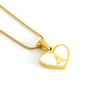 Golden heart necklace with white shell A initial pendant on a sleek snake chain
