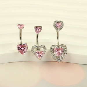 Three-piece silver belly button ring set with heart-shaped pink zircon stones