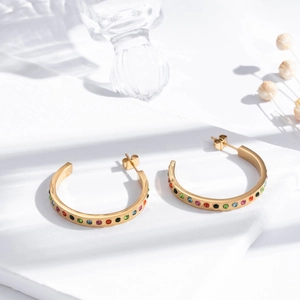 Luxury gold C-shaped stainless steel earrings with multi-color rhinestones on white stone