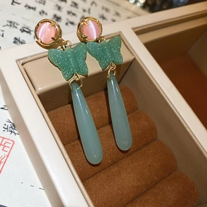 Elegant Chinese butterfly drop earrings with cat eye stones and jade-like resin accents